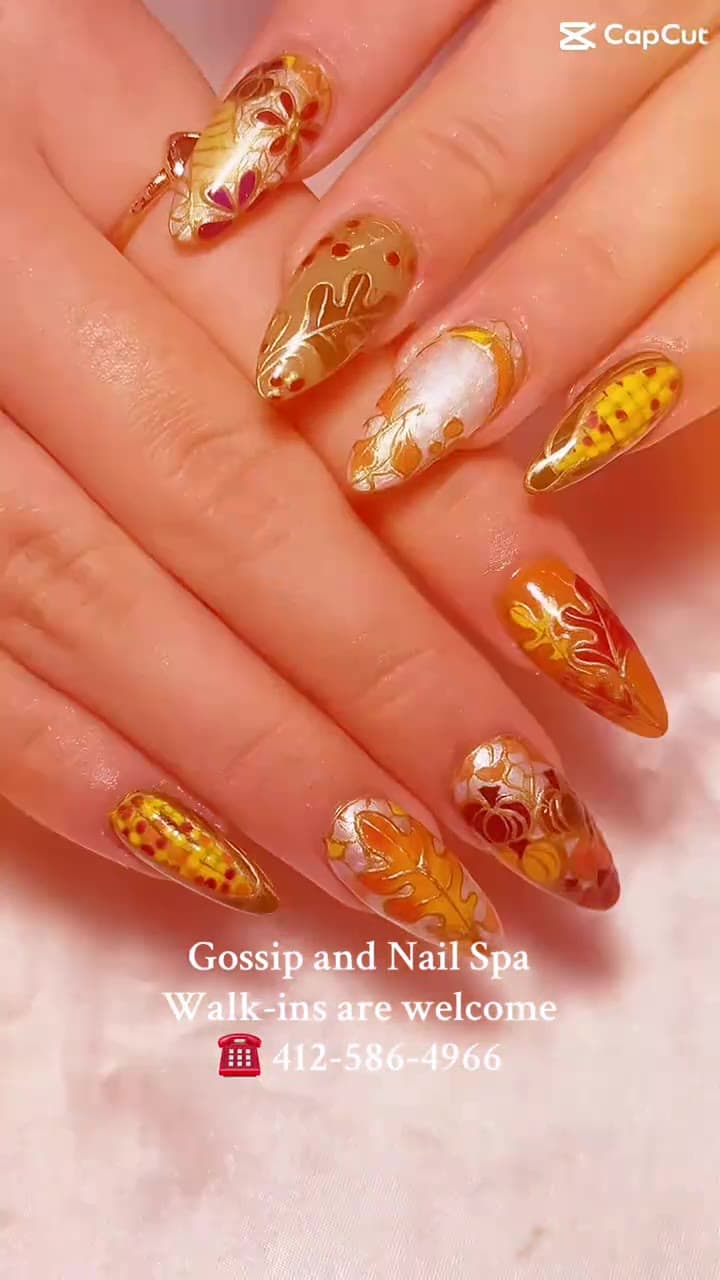 Harvest stiletto nails with pumpkin and corn details